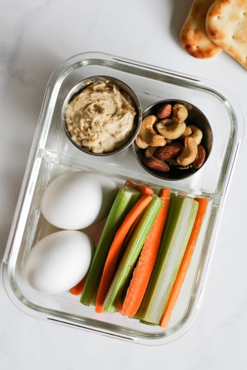 Hard-Boiled Eggs With Hummus And Carrot Sticks