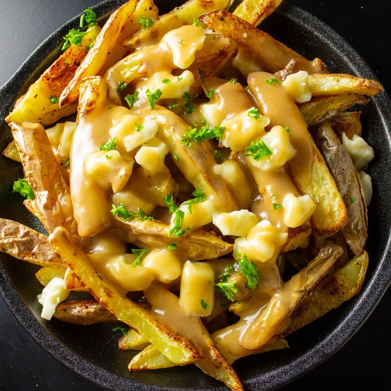 Poutine (Fries With Gravy And Cheese Curds)