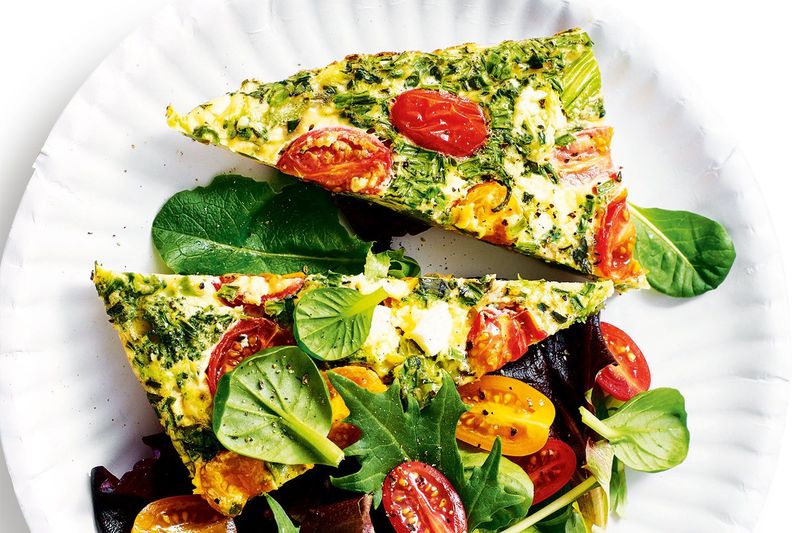 Veggie-Packed Frittata Slice With Mixed Greens
