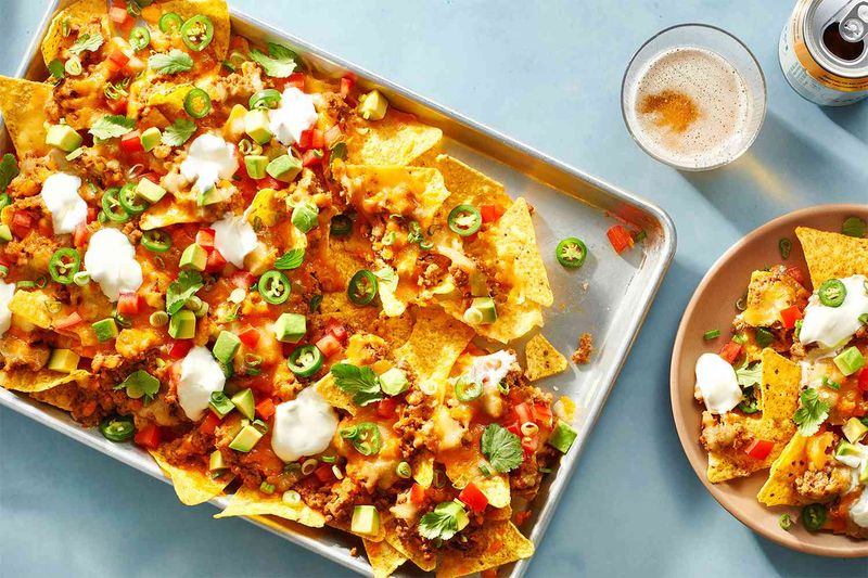 Top Nachos Before Baking