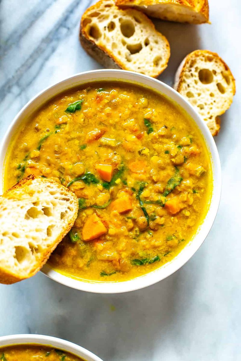 Instant Lentil Soup Cup With a Slice Of Bread