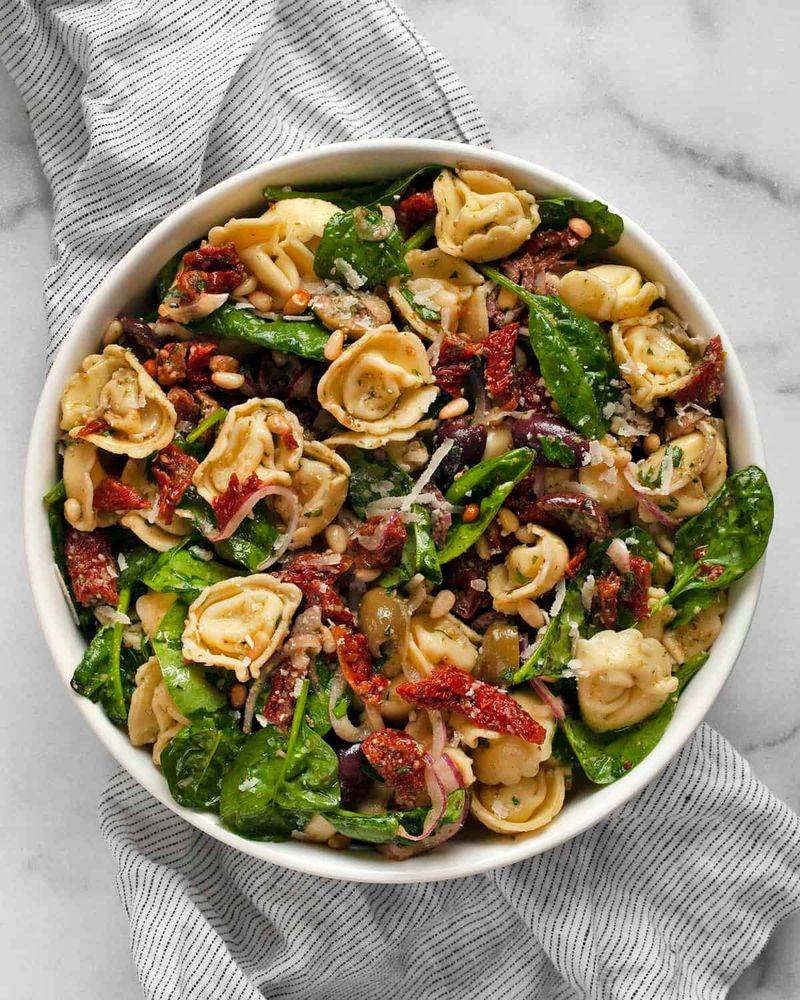Spinach Salad With Tortellini & Roasted Onions