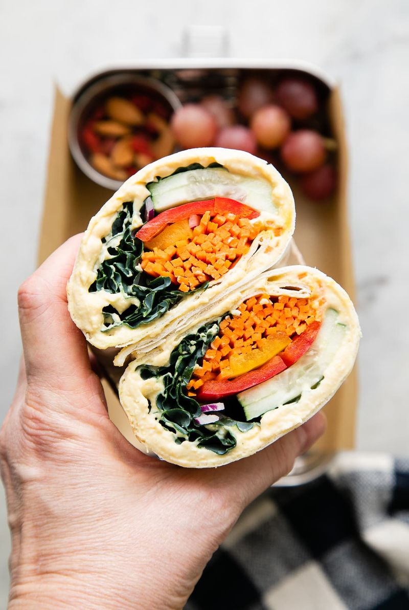 Prep A Wrap With Greens, Hummus, And Protein