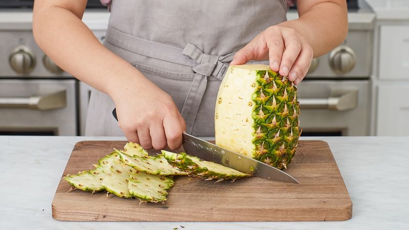 Stand The Pineapple Upright To Slice