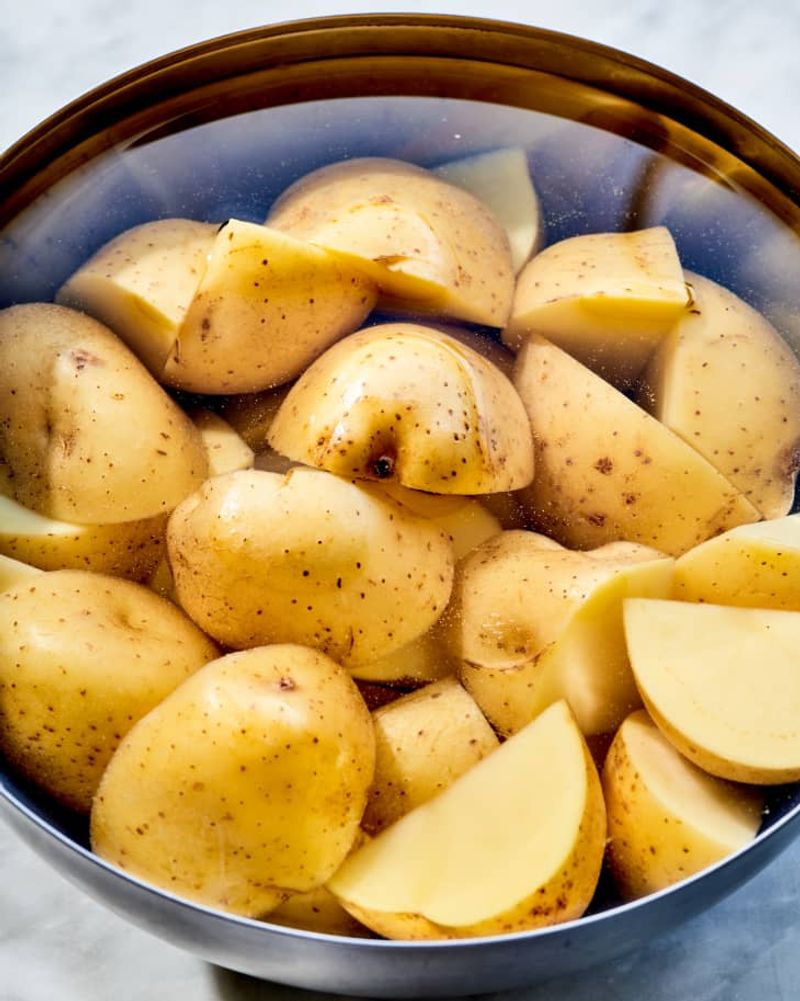 Cutting The Potatoes Into Uneven Pieces