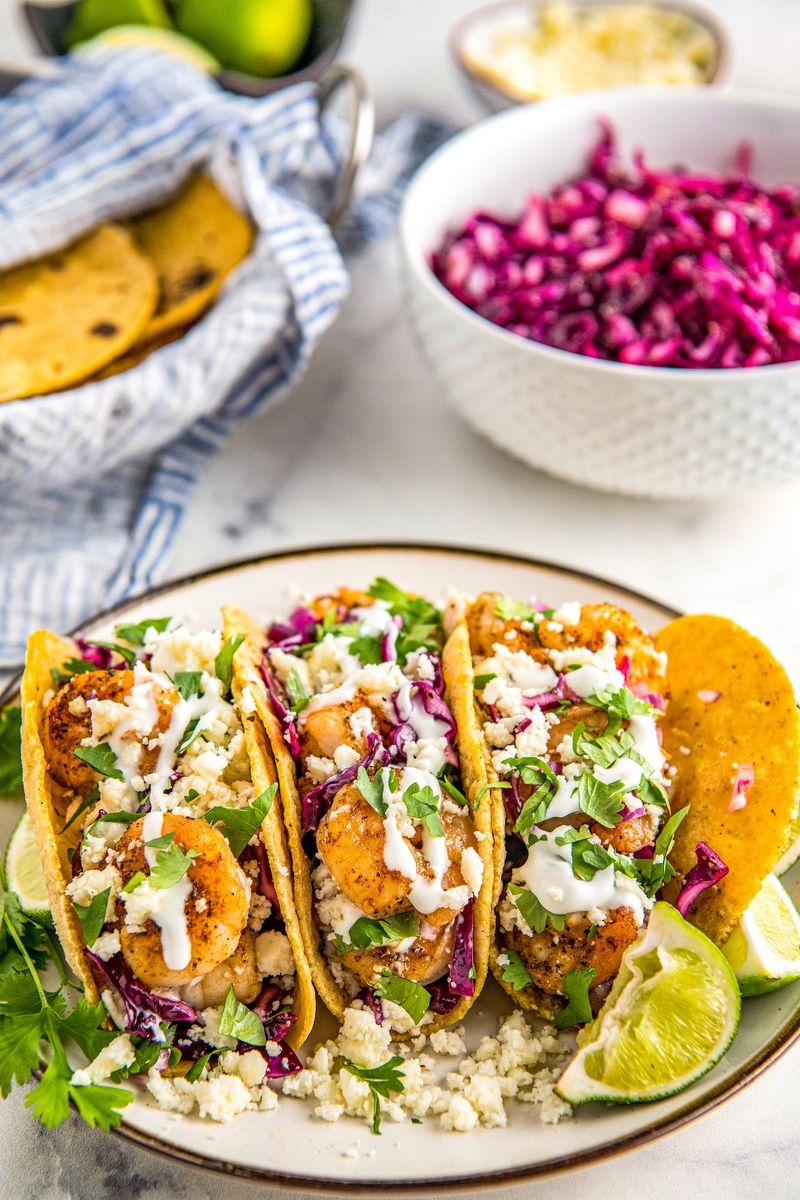 Shrimp Tacos With Slaw And Lime Crema