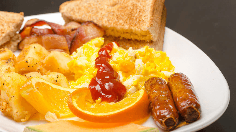Putting Ketchup On Eggs