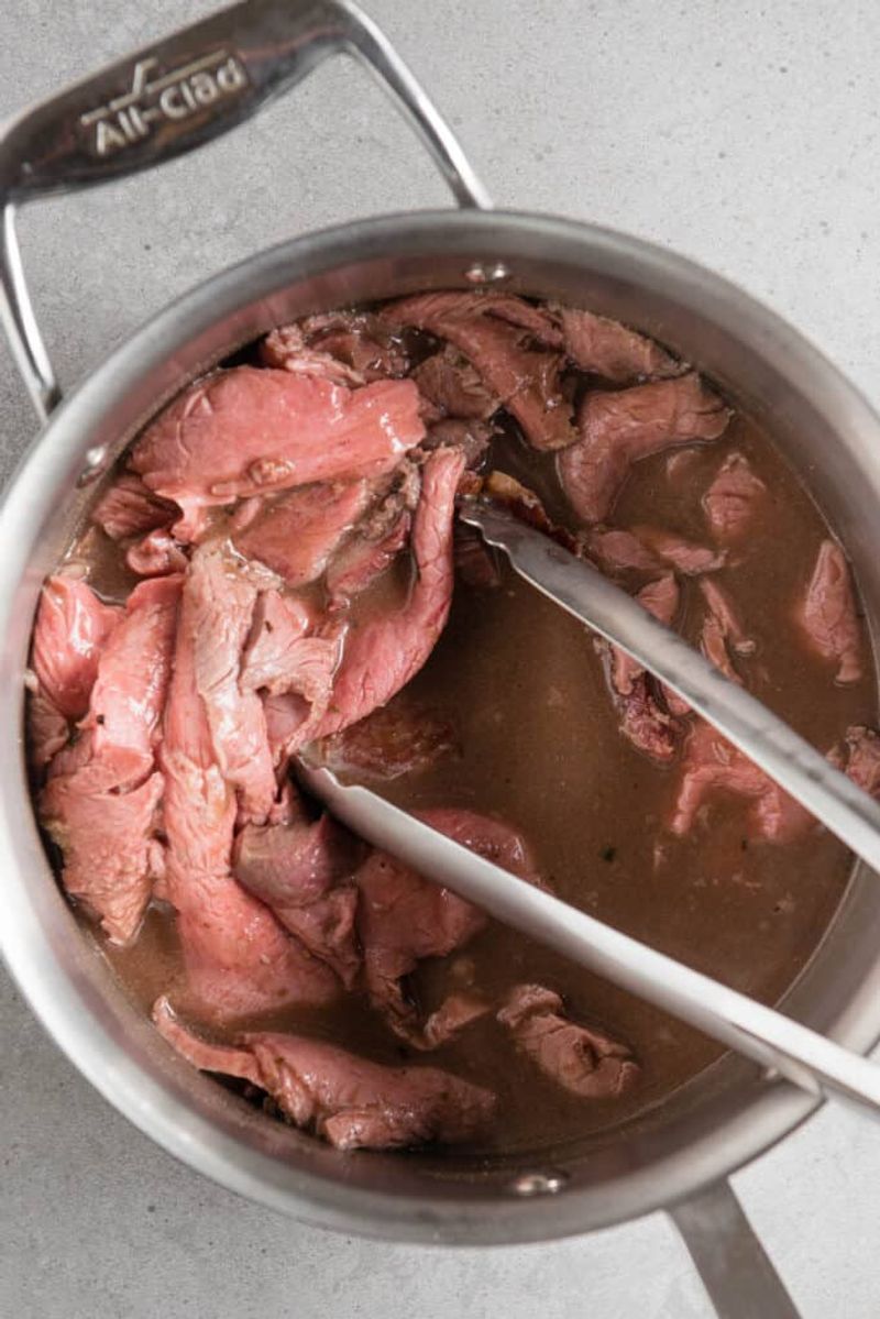 The Beef Is Roasted, Sliced Thin, And Soaked in Jus