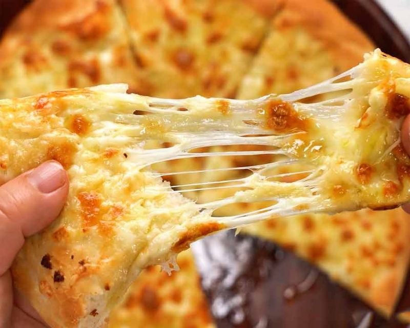 Pizza With Extra Cheese
