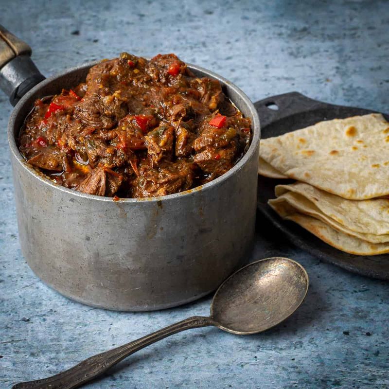Carne Guisada (CAR-neh gee-SAH-dah, not CAR-nay gee-SAW-dah)