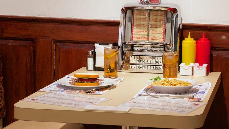 Vintage Wooden Booths With Tabletop Jukeboxes