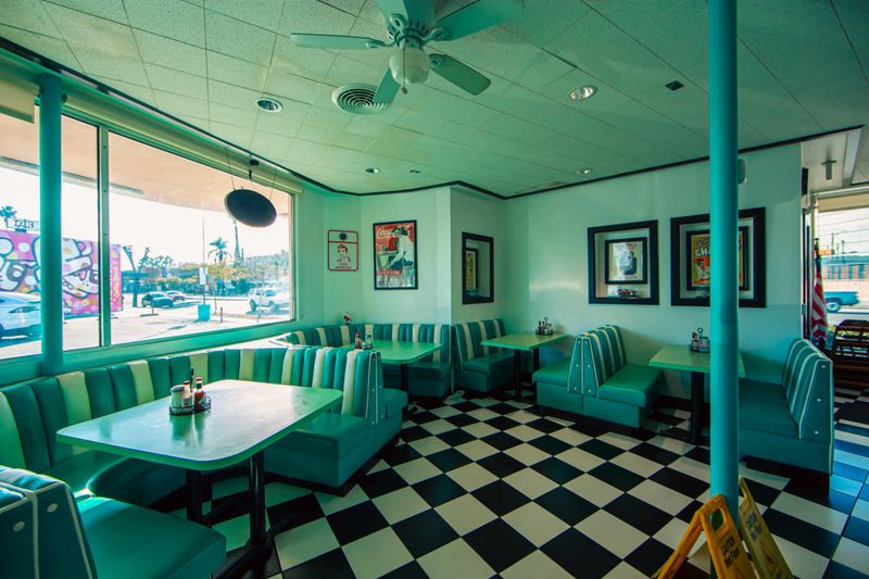 Green Checkered Floor And Mid-Century Diner Decor